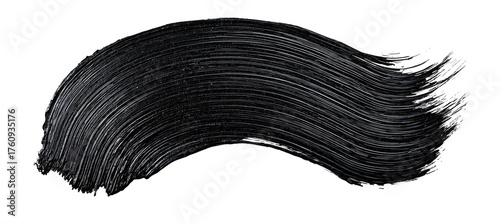 Black mascara swipe against a black background