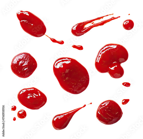 Red sauce splatters on black background