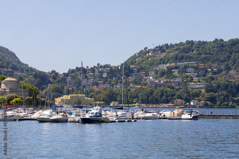 Fototapeta premium yachts at the marina of a mountain lake in Europe. Marina on Lake Como