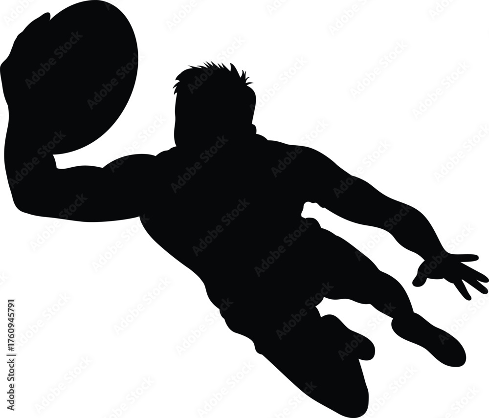 Obraz premium Dynamic silhouette of a rugby player in mid air catching the ball during a game