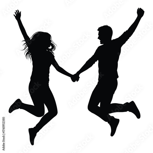 Joyful silhouette couple holding hands jumping high in celebration of love and happiness