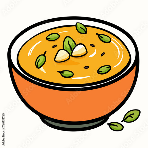Soup in an orange bowl garnished with herbs and seeds  