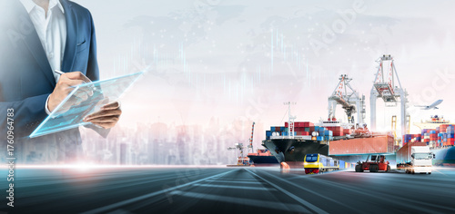 Global Digital Logistics and Supply Chain Management. Businessman Planning Future Freight Transportation Network with Smart Tablet for Worldwide Cargo Shipping, Modern Trade, and Multimodal Solutions.