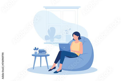 Woman relaxing reading book on beanbag chair cozy home scene with small table and lamp