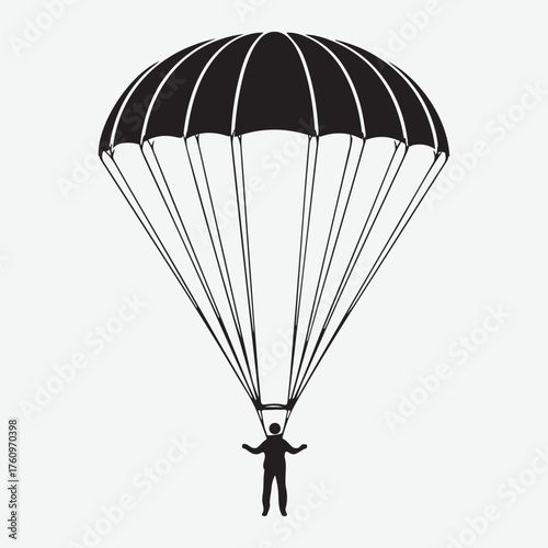Silhouette of a Parachutist Descending with a Black Parachute