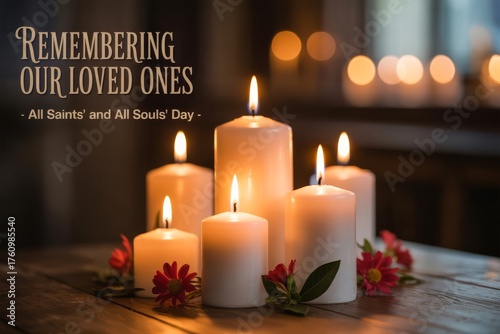 Remembrance candles and flowers on wooden table for All Souls Day