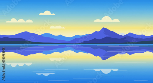 Majestic Mountain Range Reflected in a Calm Lake Under a Clear Sky with Sunrise or Sunset Hues, Depicting a Peaceful Natural Landscape
