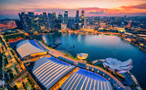 Photography Blurred abstract background lights, beautiful cityscape view of Singapore city skyline at sunset