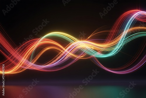 Swirling neon light trails in vibrant red orange yellow and blue on black abstract