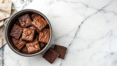 Brownie square dessert in pot, homemade chocolate bake, rustic kitchen counter view, soft texture, sweet treat, cozy mood, minimal style