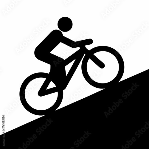 Silhouette of a cyclist riding uphill indicating mountain biking or difficulty