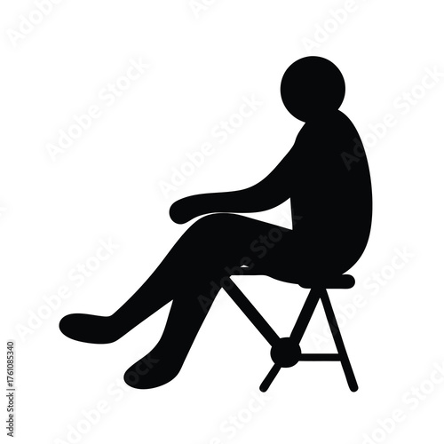Silhouette of a person sitting on a small stool with legs extended