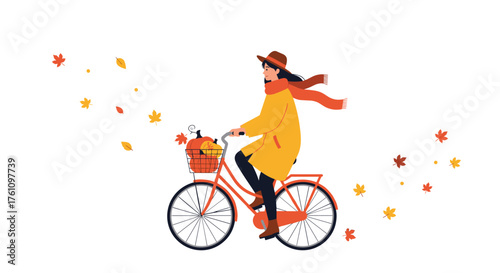 A woman in a yellow coat rides a bicycle through falling autumn leaves.