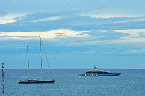 Four small sailboats