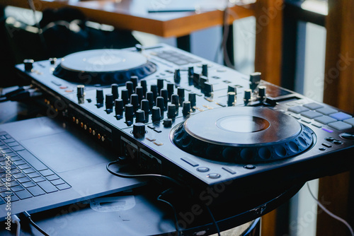 the DJ's console is on the table