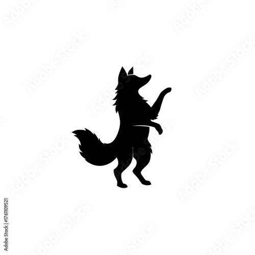 Black silhouette of a wild fox or wolf standing on hind legs, a minimalist graphic vector design element or animal icon