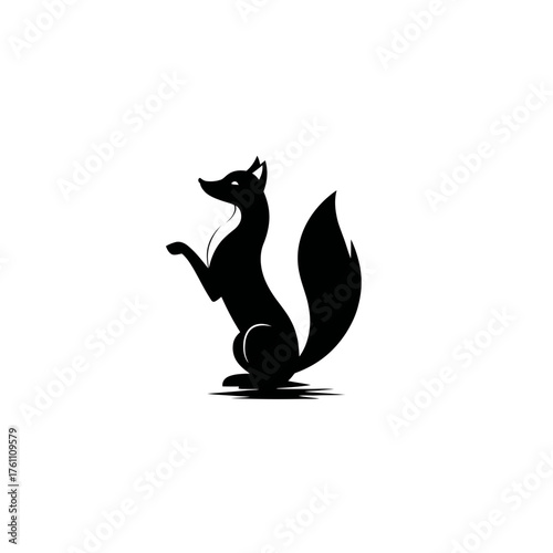 Sleek black fox silhouette standing on hind legs, a minimalist vector graphic ideal for logos, elegant design, and wild nature concepts.