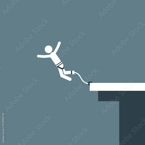 Person jumping from platform with bungee cord attached.