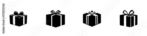 Black gift boxes with bows arranged in a row on a white background for festive occasions and celebrations