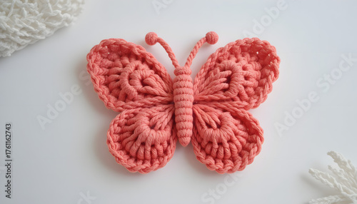 Handmade crochet butterfly coral color perfect for baby room decoration or a gift