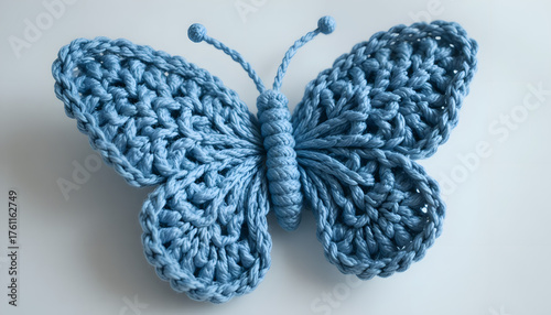 Handmade crochet butterfly a textured textile art piece perfect for spring decor or a craft project