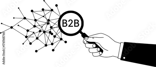 hand holding a black ink pen