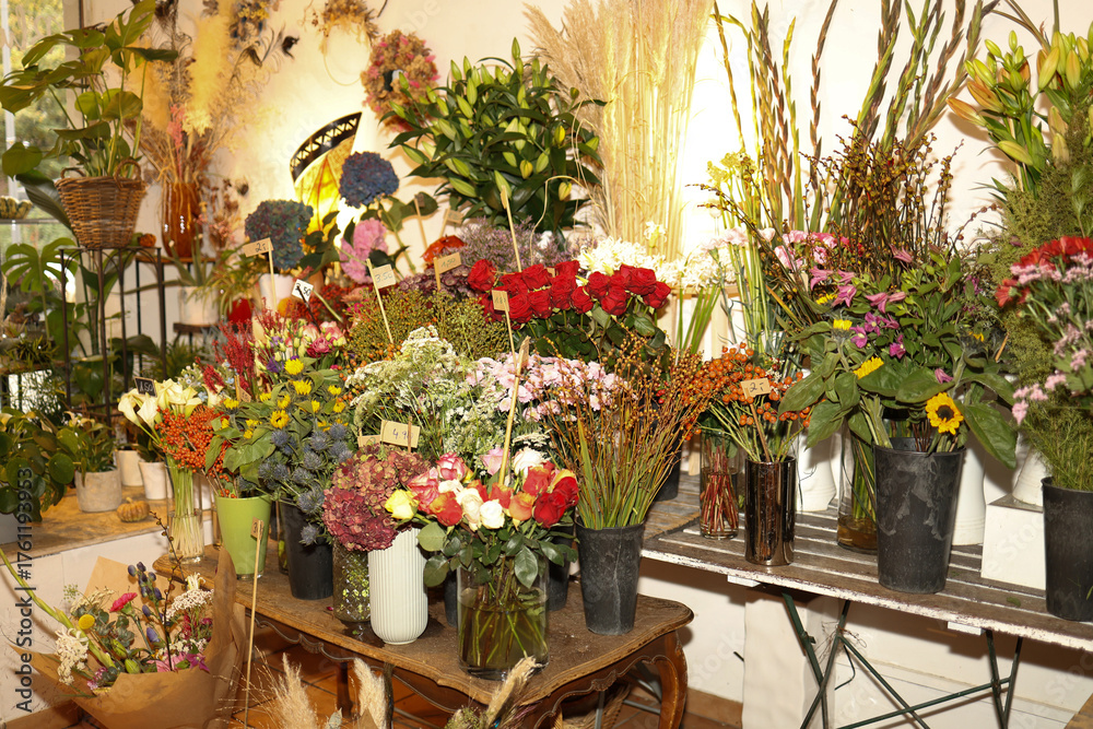 Fototapeta premium Flowers on the window of flower shop.