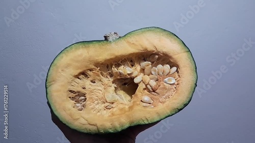 Japanese pumpkin vegetable half piece video footage isolated. Healthy nutritional raw vegetable. 