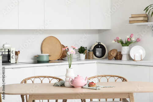 Pink teapot, tasty cake and...