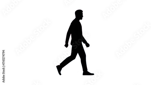 A Silhouette of a Person Walking in the Light.
