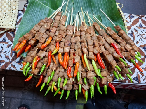Sate Kere Solo is satay made from braised tempeh and braised gembus, then grilled over charcoal. Indonesian food.