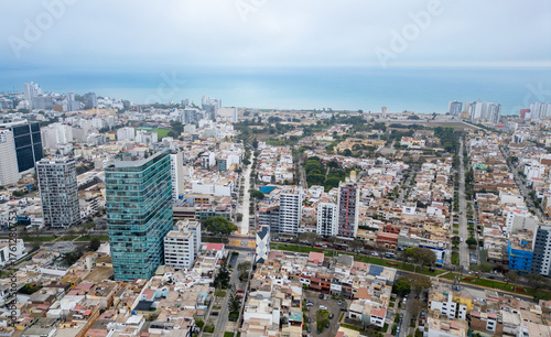 Aerial drone view of streets and buildings in Magdalena del Mar neighborhood district.