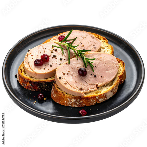 Foie gras toasts with cranberries and rosemary on a black plate isolated white background