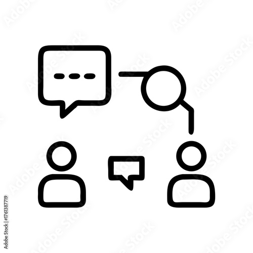 A close up of a black and white cat s face with intense green eyes