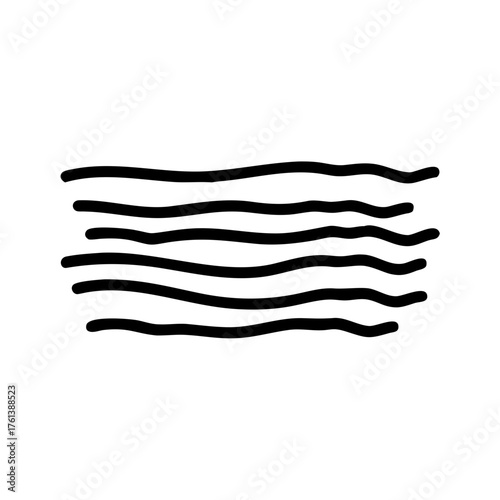 A close up of a black cat with striking green eyes