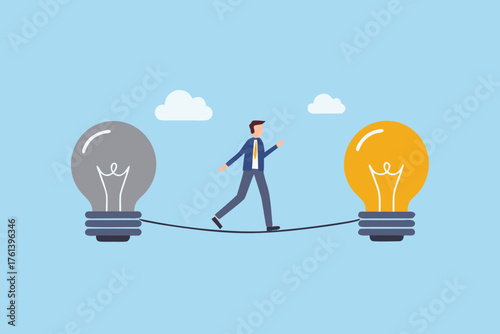 Businessman walking a tightrope between a grey and a bright yellow light bulb representing ideas
