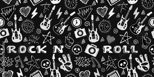 Retro rock and roll doodle pattern with guitars skulls and music symbols on black background