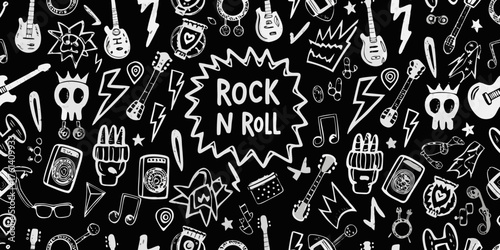 Hand drawn rock and roll music icons and symbols on a black background