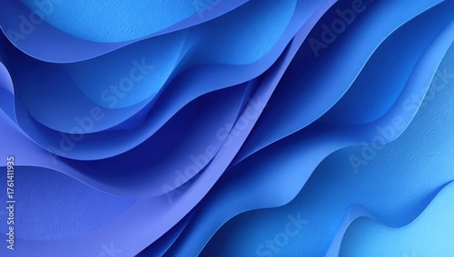 Curved layers of textured blue paper forming a spiral abstract pattern with smooth gradients and dramatic light and shadow play.