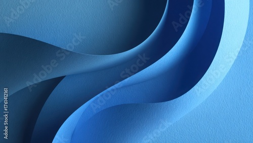 Curved layers of textured blue paper forming a spiral abstract pattern with smooth gradients and dramatic light and shadow play.