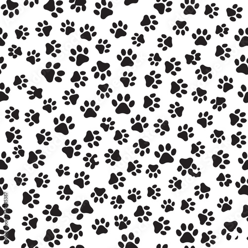 Seamless pattern of black paw prints on white animal