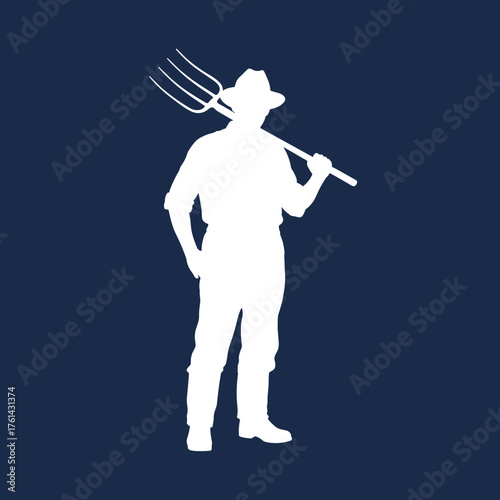 Farmer standing with pitchfork on dark background  