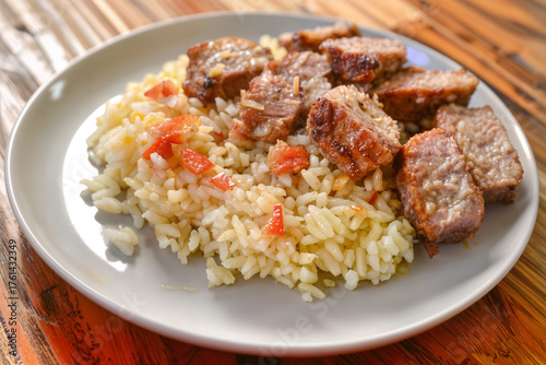 Asian-style dish of rice with braised meat, green onions, and fresh sprouts on top.
