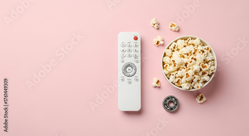 Bowl of Popcorn Remote Control Ready for Entertainment Enjoying Leisure Time Relaxing at Home Movie Night Snack and Viewing Pleasure