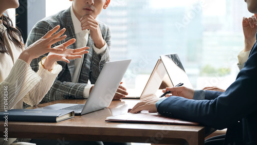 Konstfotografi Group of casual business people meeting in an office