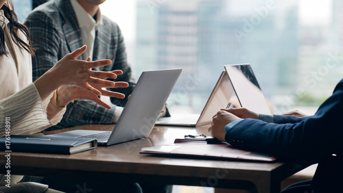 Group of casual business people meeting in an office