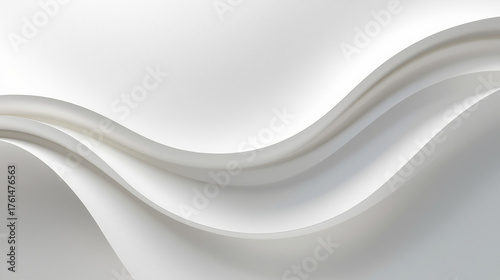 Elegant abstract background with smooth white and light grey flowing waves and curves, creating a serene and modern design.