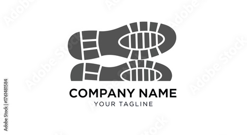 Pair of shoe sole prints in dark gray, symbolizing adventure and journey.