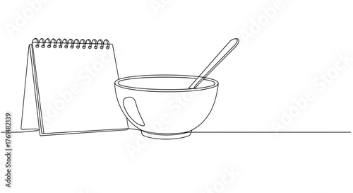 Cereal bowl beside drawing pad – A quiet moment of creativity and nourishment
