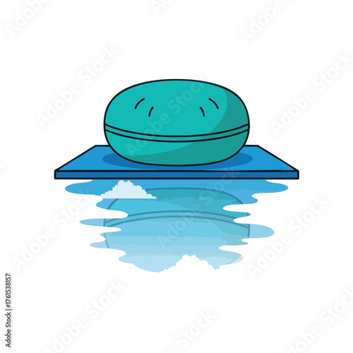 A teal macaron on a blue platform with a sky reflection.